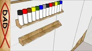 Spray paint can storage shelf for garage or shop.