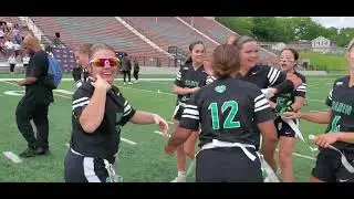 The Badin Rams girls flag football team celebrates winning their first state championship. 