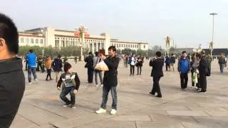 Tiananmen Square - Army marching about.. Mao Zedong Portrait