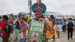 Mothers join the Global Climate March on the streets of Bel&eacute;m during COP30