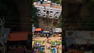 Building Collapses Over Market &ndash; People Flee #disaster