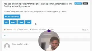 You see a flashing yellow traffic signal at an upcoming intersection. The flashing yellow light