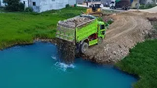 New project Construction using a giant folding machine with obstacles to clear it with a 5 ton truck