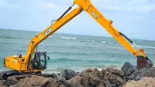 JCB 245 HDLR and Kumatsu 210 Tata 140 Excavator Stones Being Laid to prevent Soil erosion on Beach