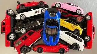 Box full of diecast Cars, Top toy Cars, SLR, Ferrari, Jeep, Jaguar, Lexus 570, Lamborghini