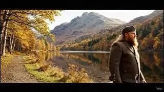 Scotsman Walking Wearing Kilt By Loch Achray On Autumn History Visit To Trossachs Scotland