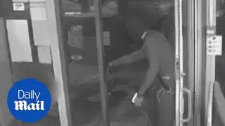 Frightening bank robbery shows security guards attacked and threatened with a gun - Daily Mail