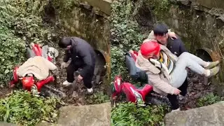 A Woman Riding A Motorcycle Accidentally Fell Into A Ditch, And Kind People Came To Help#help #funny