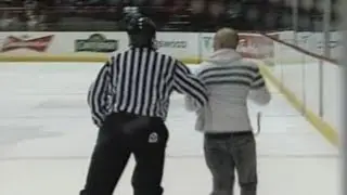 Drunk Fan Jumps On Ice At Hockey Game