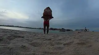 Shoulder ride challenge on the beach