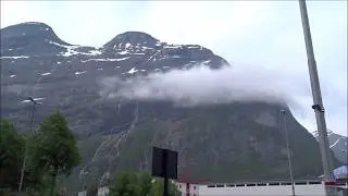 Clouds crawling around the mountain in Sunndals&oslash;ra, Norway