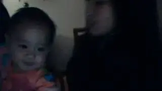 A baby spitting or blowing rasberries