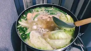“Hot and Sour Filipino Shrimp and Squid Soup”with vegetables 