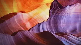 Entry Point Into My Quantum Healing Session: A pink/orange portal on an island of stone