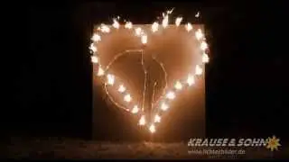Lichterbild Verwandlung Herz in Ringe, Heiratsantrag