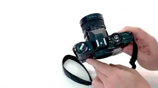 Minolta XD-7 mit Auto Winder D, MD 24mm 1:2,8 , Gegenlichtblende und UV-Filter