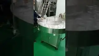 Rotary jar filling machine for nuts