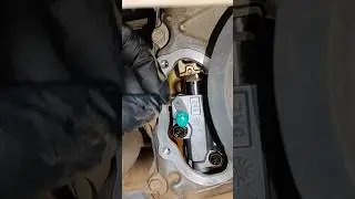 Pulling pin timing chain tensioner