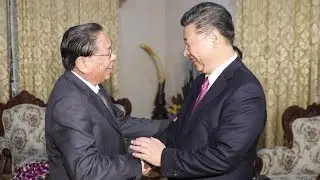 Chinese president meets former president of Laos