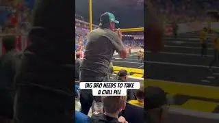 Guy freaks out at football game!!!!