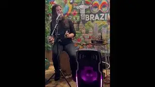Camila Louzada and Mario Silva playing at Little Brazil’s holiday event, Dec 2025.