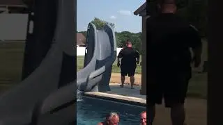 Fat Man goes down water slide