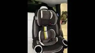 Tesla Model Y Performance back seat with two Graco car seats.