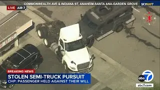 SWAT vehicle slams into semi-truck during chase
