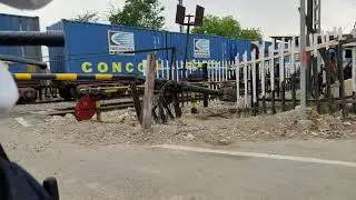 Concor freight train at Railway Crossing