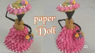 Paper doll using pista shells / Best out of waste / old newspaper