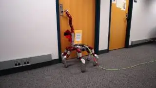 Snake Monster robot opens a door to make a delivery