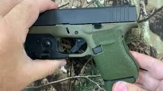 Custom made Army Green (OD) grip tape overlay installed on a Glock 43
