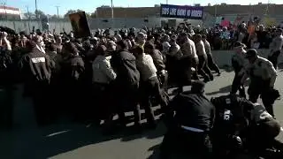 Protesters clash with police at ICE facility near Chicago | REUTERS