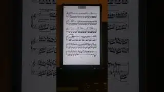 Music score tablet paired with page-turning pedal