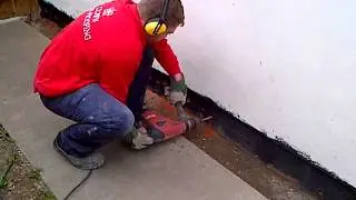 Drilling out ready to Install a Dryzone DPC.
