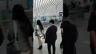 My Wife And I waiting to go through Airport Security
