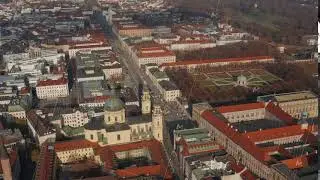 Wide View above Court Garden in Munich, Germany and City streets with Traffic in Winter, Daylight