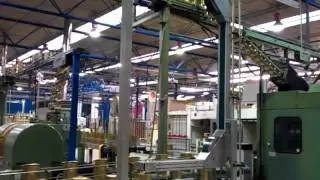 Vertical magnetic tin can conveyor, elevator turner