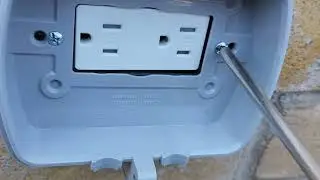 Paul Installing a new weather cover on an outdoor outlet