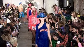 Models and designer on the runway of Nicopanda fashion show in London