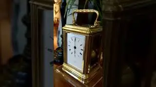 Grohe carriage clock striking the six o'clock on a fine bell.