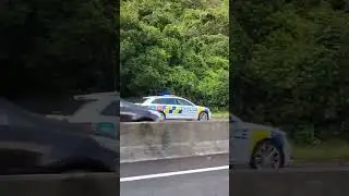 Motorcycle #Unit And #Police Car On #Scene Of #Traffic Stop