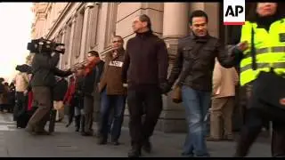 Unemployed link hands to protest lack of support