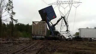 BRUKS 805 DUMPING INTO A 13 FT CHIP VAN