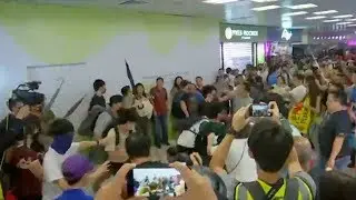 Opposite groups clash in HK shopping mall scuffles