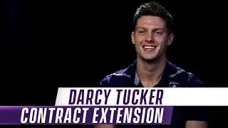 Tucker signs on!