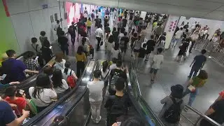 Transferring from Metro Line 1 to Line 2 at People Square in Shanghai