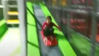Wonderful Slop Sled Slides with slide seat inside a soft playground area