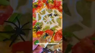 spooky 7 layer dip for a fun halloween snack