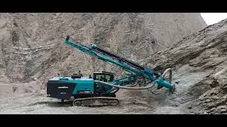 Sunward Mining: DTH drilling rig on mine site doing horizontal drilling